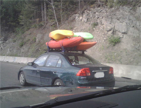 Four boats on a little car - these guys get an 'A' for effort.